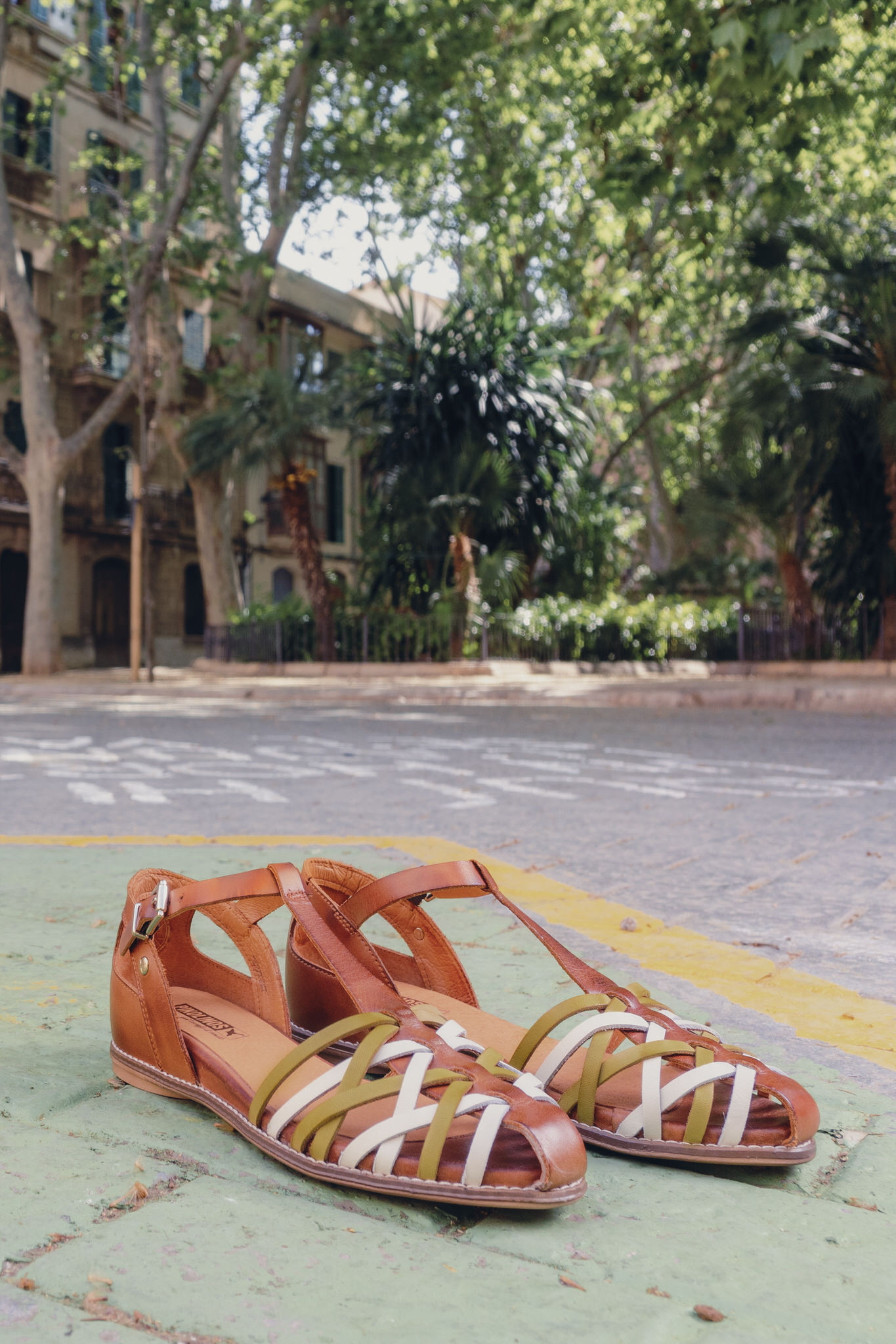 Photograph of Pikolinos women's sandals in the street